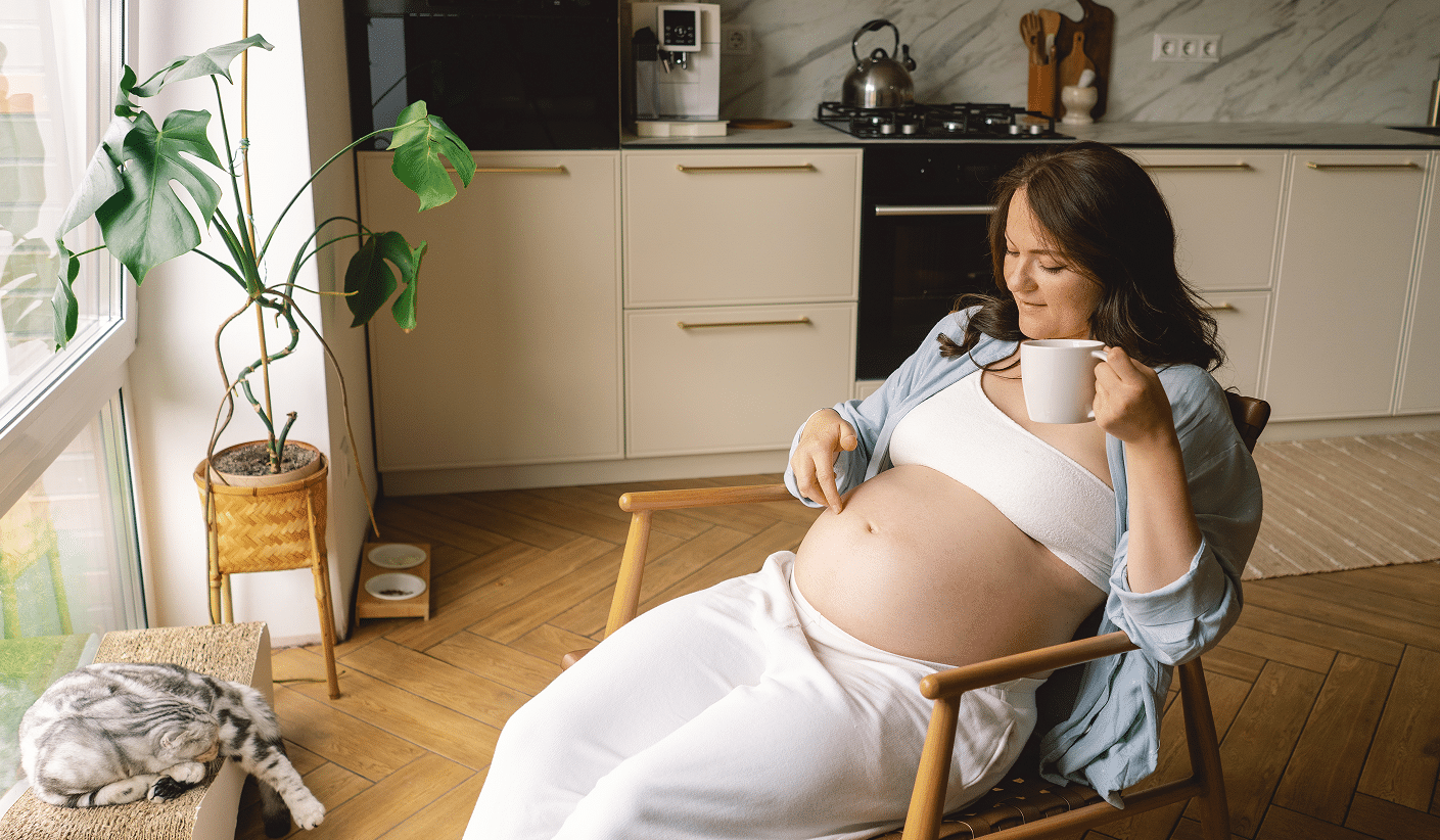 pregnant-woman-gently-holding-her-pregnant-belly