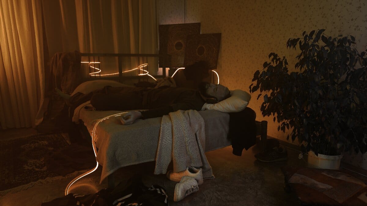 young-man-using-smartphone-lying-on-bed-at-bedroom